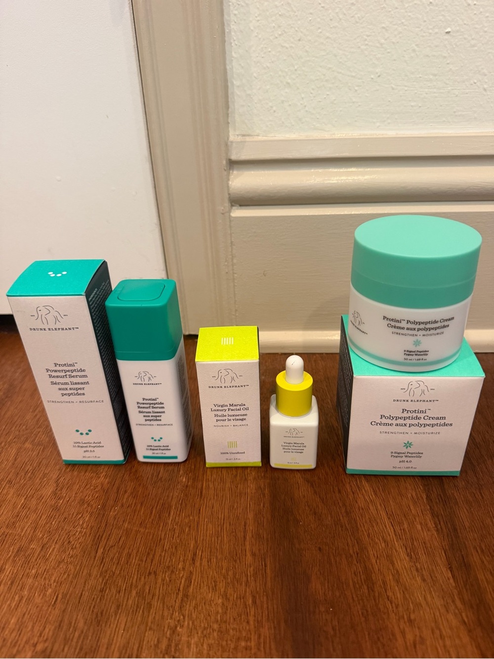 Drunk Elephant Mint Green and Yellow Skincare Serum & Cream Set